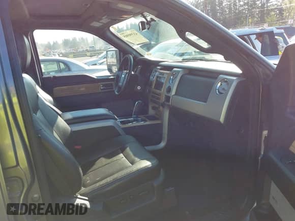 2011 Ford F-150 Lariat with VIN 1FTFW1ET1BFA82757, listed as a IAAI auction lot 43390905 with 128,796 mi miles and . Bid and sale history available at DreamBid. Image 5.