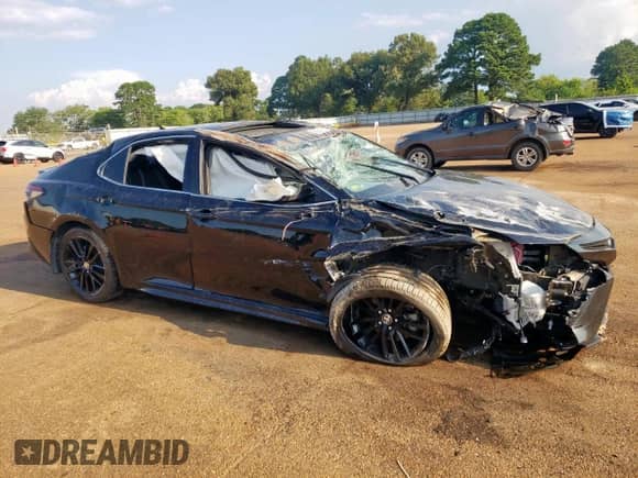 2022 Toyota Camry Hybrid XSE z VIN 4T1K31AK8NU570927, wystawiony jako Copart lot #68264105 z przebiegiem 53 713 mil mil oraz Szkoda całkowita • Salvage title. Historia ofert i sprzedaży dostępna na DreamBid. Obrazek 4.