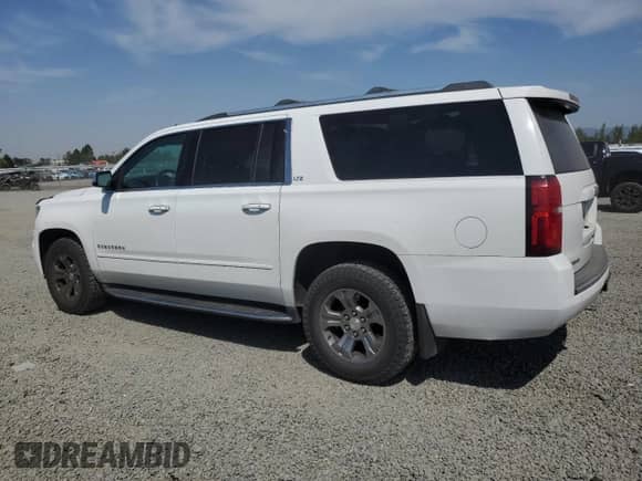 2015 Chevrolet Suburban LTZ с VIN 1GNSKKKC6FR262798, выставлен на аукционе Copart как лот 62321285 с пробегом 159 294 миль миль и Списание • Salvage title. История ставок и продаж доступна на DreamBid. Изображение 2.
