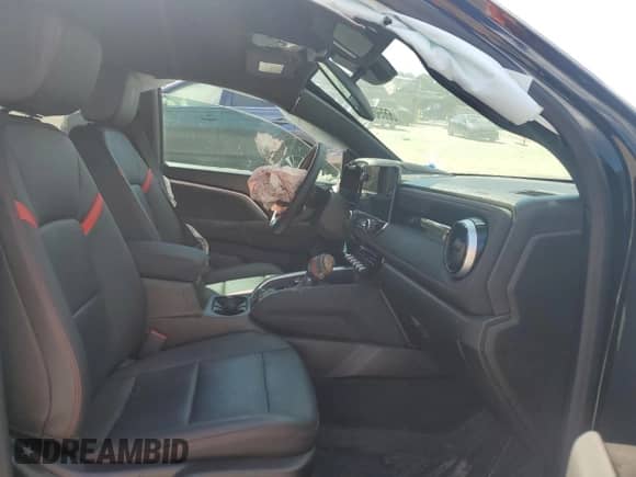 2023 Chevrolet Colorado 4WD Z71 with VIN 1GCPTDEK8P1218375, listed as a Copart auction lot 66690985 with Not provided miles and Salvage title. Bid and sale history available at DreamBid. Image 7.