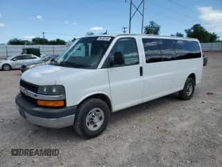 2013 Chevrolet Express Passenger LT с VIN 1GAZG1FG9D1189947, выставлен на аукционе Copart как лот 54183165 с пробегом 84 745 миль миль и Списание • Salvage title. История ставок и продаж доступна на DreamBid. Изображение 1.
