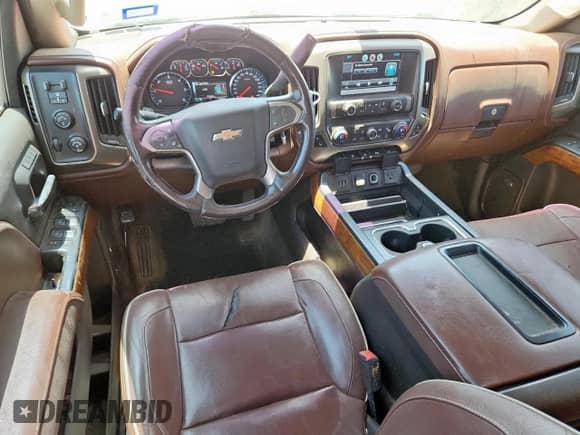 2015 Chevrolet Silverado 1500 High Country z VIN 3GCUKTEC5FG174103, wystawiony jako Copart lot #61202835 z przebiegiem 179 628 mil mil oraz Czysty tytuł • Clean title. Historia ofert i sprzedaży dostępna na DreamBid. Obrazek 8.