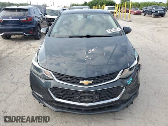 2017 Chevrolet Cruze LT с VIN 3G1BE6SM4HS566463, выставлен на аукционе Copart как лот 68772525 с пробегом 166 842 миль миль и Списание • Salvage title. История ставок и продаж доступна на DreamBid. Изображение 5.
