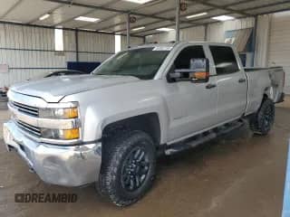 2018 Chevrolet Silverado 2500HD Work Truck with VIN 1GC1KUEG1JF181510, listed as a Copart auction lot 69602155 with 137,979 mi miles and Salvage title. Bid and sale history available at DreamBid. Image 1.