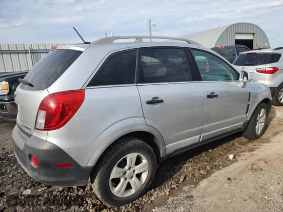 2014 Chevrolet Captiva Sport LS с VIN 3GNAL1EK6ES613551, выставлен на аукционе Copart как лот 81738865 с пробегом 127 424 миль миль и Списание • Salvage title. История ставок и продаж доступна на DreamBid. Изображение 3.