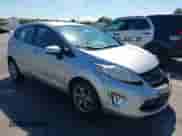 2011 Ford Fiesta SES with VIN 3FADP4FJ9BM146004, listed as a IAAI auction lot 43277473 with 147,864 mi miles and . Bid and sale history available at DreamBid. Image 1.