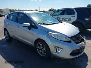 2011 Ford Fiesta SES with VIN 3FADP4FJ9BM146004, listed as a IAAI auction lot 43277473 with 147,864 mi miles and . Bid and sale history available at DreamBid. Image 1.