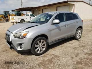 2013 Mitsubishi Outlander SE z VIN 4A4AP4AUXDE024591, wystawiony jako Copart lot #56074385 z przebiegiem 124 953 mil mil oraz Szkoda całkowita • Salvage title. Historia ofert i sprzedaży dostępna na DreamBid. Obrazek 1.