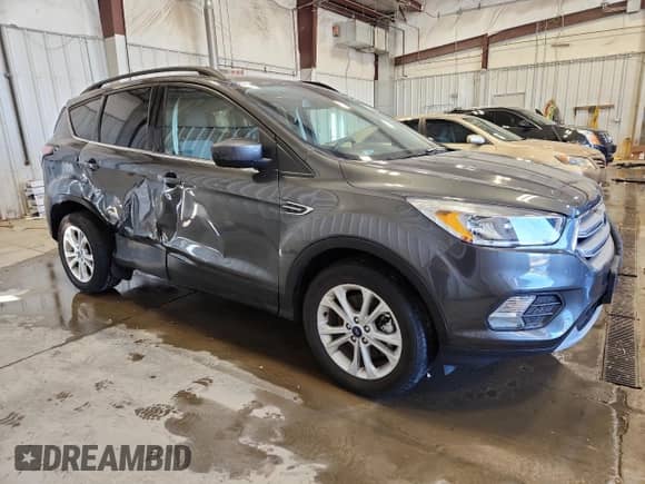 2018 Ford Escape SE с VIN 1FMCU9GD3JUC28921, выставлен на аукционе Copart как лот 85359035 с пробегом 48 632 миль миль и Чистый • Clean title. История ставок и продаж доступна на DreamBid. Изображение 4.