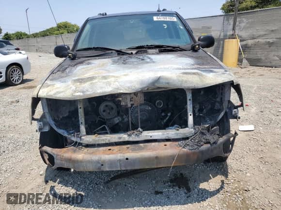 2005 Chevrolet TrailBlazer LT z VIN 1GNDS13S252325377, wystawiony jako Copart lot #64788165 z przebiegiem Nie podano mil oraz Szkoda całkowita • Salvage title. Historia ofert i sprzedaży dostępna na DreamBid. Obrazek 5.