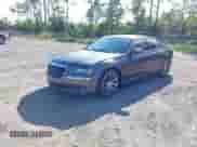 2014 Chrysler 300 S с VIN 2C3CCABG1EH148511, выставлен на аукционе IAAI как лот 42591400 с пробегом 196 626 миль миль и . История ставок и продаж доступна на DreamBid. Изображение 2.