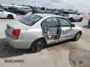 2005 Hyundai Elantra z VIN KMHDM46D05U165078, wystawiony jako Copart lot #73365894 z przebiegiem 142 314 mil mil oraz Szkoda całkowita • Salvage title. Historia ofert i sprzedaży dostępna na DreamBid. Obrazek 3.