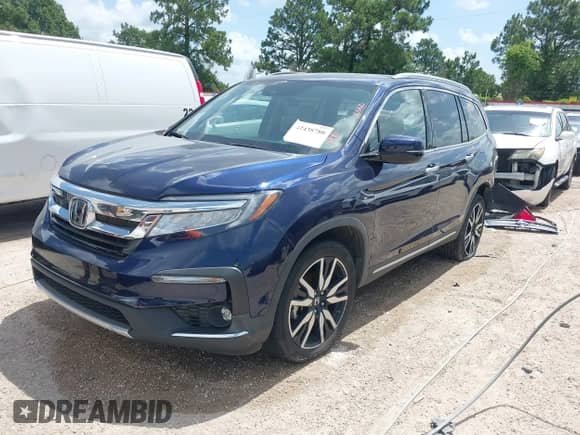 2022 Honda Pilot Touring 7-Passenger z VIN 5FNYF5H61NB019768, wystawiony jako IAAI lot #42438780 z przebiegiem Nie podano mil oraz . Historia ofert i sprzedaży dostępna na DreamBid. Obrazek 18.