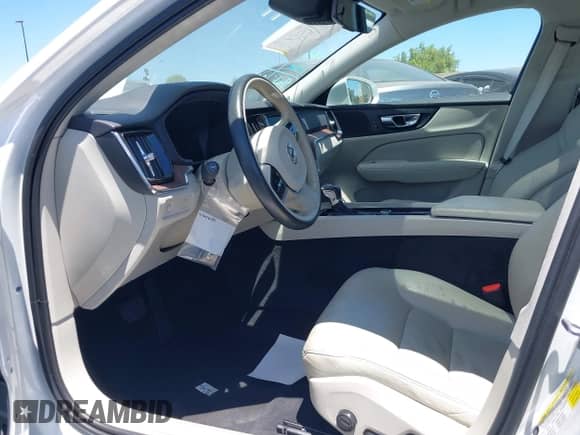 2021 Volvo S60 Momentum with VIN 7JR102FK9MG096783, listed as a IAAI auction lot 42606702 with 63,724 mi miles and . Bid and sale history available at DreamBid. Image 5.