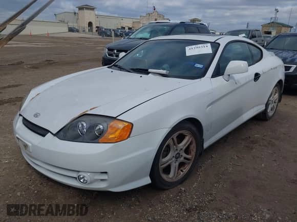 2003 Hyundai Tiburon GT с VIN KMHHN65FX3U034914, выставлен на аукционе IAAI как лот 41299314 с пробегом 204 378 миль миль и . История ставок и продаж доступна на DreamBid. Изображение 2.