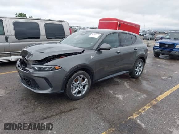 2024 Dodge Hornet R/T with VIN ZACPDFCWXR3A25038, listed as a IAAI auction lot 42852217 with 31,348 mi miles and . Bid and sale history available at DreamBid. Image 2.