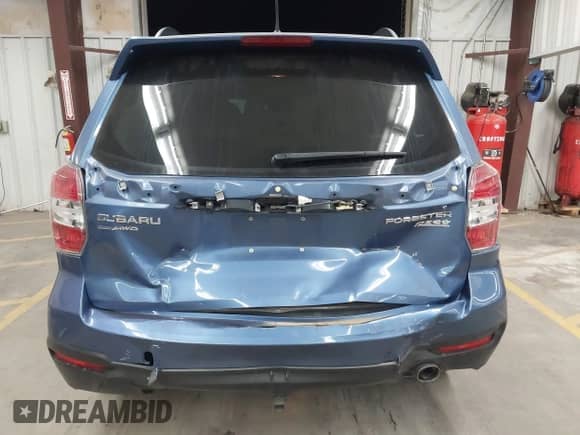 2015 Subaru Forester Touring with VIN JF2SJAUC9FH807385, listed as a IAAI auction lot 43508096 with 103,862 mi miles and . Bid and sale history available at DreamBid. Image 17.