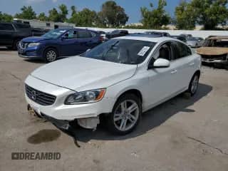 2014 Volvo S60 T5 с VIN YV1612FS6E1295211, выставлен на аукционе Copart как лот 68527425 с пробегом Не указан миль и Списание • Salvage title. История ставок и продаж доступна на DreamBid. Изображение 1.