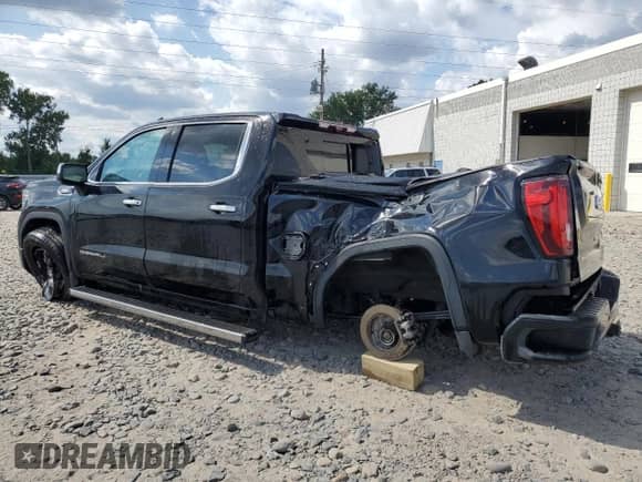 2023 GMC Sierra 1500 Denali с VIN 3GTUUGE85PG143996, выставлен на аукционе Copart как лот 70958025 с пробегом 57 331 миль миль и Списание • Salvage title. История ставок и продаж доступна на DreamBid. Изображение 2.