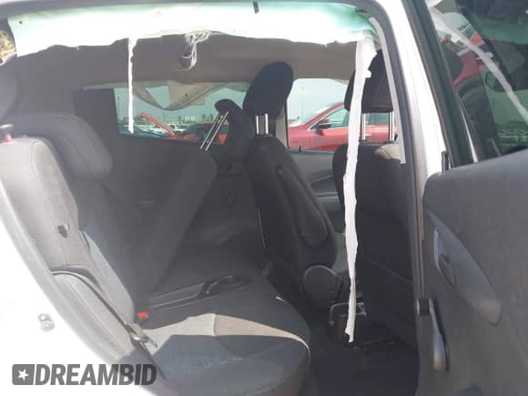 2022 Chevrolet Spark LS with VIN KL8CB6SA1NC003990, listed as a IAAI auction lot 41923142 with 41,104 mi miles and . Bid and sale history available at DreamBid. Image 8.
