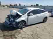 2022 Toyota Prius Limited with VIN JTDKAMFP9N3204173, listed as a Copart auction lot 81602525 with 104,986 mi miles and Salvage title. Bid and sale history available at DreamBid. Image 1.