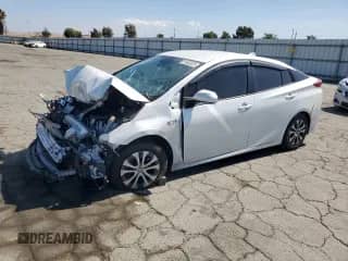 2022 Toyota Prius Limited with VIN JTDKAMFP9N3204173, listed as a Copart auction lot 81602525 with 104,986 mi miles and Salvage title. Bid and sale history available at DreamBid. Image 1.