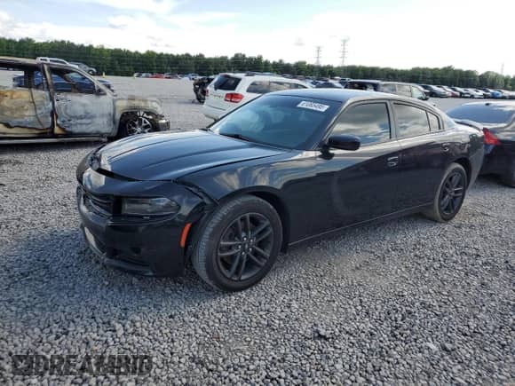 2019 Dodge Charger SXT with VIN 2C3CDXJG7KH593638, listed as a Copart auction lot 61065495 with 106,942 mi miles and Salvage title. Bid and sale history available at DreamBid. Image 1.