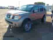 2007 Nissan Pathfinder S z VIN 5N1AR18W67C648441, wystawiony jako IAAI lot #42984543 z przebiegiem 227 634 mil mil oraz . Historia ofert i sprzedaży dostępna na DreamBid. Obrazek 2.