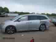 2015 Honda Odyssey Touring Elite z VIN 5FNRL5H99FB088572, wystawiony jako IAAI lot #43376437 z przebiegiem 187 701 mil mil oraz . Historia ofert i sprzedaży dostępna na DreamBid. Obrazek 14.