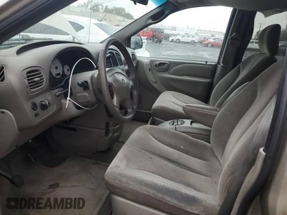 2002 Dodge Caravan ES with VIN 2B4GP54L12R581347, listed as a Copart auction lot 84217165 with 242,303 mi miles and Salvage title. Bid and sale history available at DreamBid. Image 7.