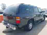 2003 Chevrolet Suburban LS z VIN 3GNEC16TX3G243519, wystawiony jako IAAI lot #42451637 z przebiegiem 133 806 mil mil oraz . Historia ofert i sprzedaży dostępna na DreamBid. Obrazek 4.
