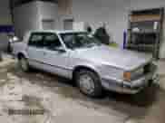 1989 Dodge Dynasty with VIN 1B3BC4634KD442902, listed as a Copart auction lot 85151394 with 63,120 mi miles and Clean title. Bid and sale history available at DreamBid. Image 4.