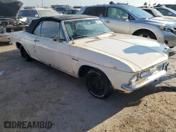 1965 Chevrolet Corvair z VIN 105375W174146, wystawiony jako Copart lot #73710124 z przebiegiem 62 799 mil mil oraz Nie do naprawy • Non repairable. Historia ofert i sprzedaży dostępna na DreamBid. Obrazek 4.