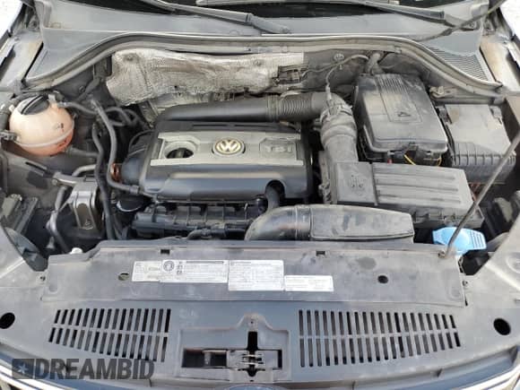 2012 Volkswagen Tiguan S с VIN WVGAV7AX4CW000140, выставлен на аукционе Copart как лот 80901355 с пробегом 133 056 миль миль и Списание • Salvage title. История ставок и продаж доступна на DreamBid. Изображение 12.