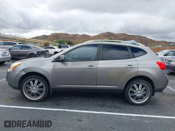 2008 Nissan Rogue S with VIN JN8AS58T48W001367, listed as a IAAI auction lot 43459668 with 189,199 mi miles and . Bid and sale history available at DreamBid. Image 14.
