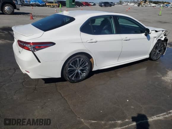 2019 Toyota Camry Hybrid SE с VIN 4T1B21HKXKU520194, выставлен на аукционе Copart как лот 86868045 с пробегом 100 431 миль миль и Списание • Salvage title. История ставок и продаж доступна на DreamBid. Изображение 3.