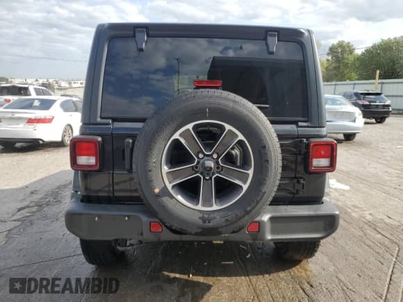 2023 Jeep Wrangler Sahara Altitude with VIN 1C4HJXEG1PW600466, listed as a Copart auction lot 80017505 with 21,912 mi miles and Salvage title. Bid and sale history available at DreamBid. Image 6.