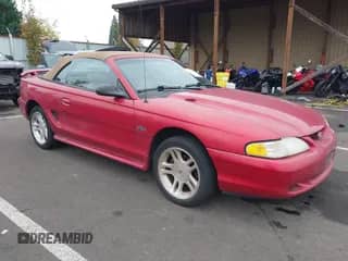 1998 Ford Mustang GT z VIN 1FAFP45X7WF209735, wystawiony jako IAAI lot #43477107 z przebiegiem 104 520 mil mil oraz . Historia ofert i sprzedaży dostępna na DreamBid. Obrazek 1.