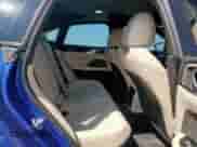 2024 BMW i4 M50 with VIN WBY33AW05RFS67158, listed as a Copart auction lot 71548875 with 8,729 mi miles and Salvage title. Bid and sale history available at DreamBid. Image 10.