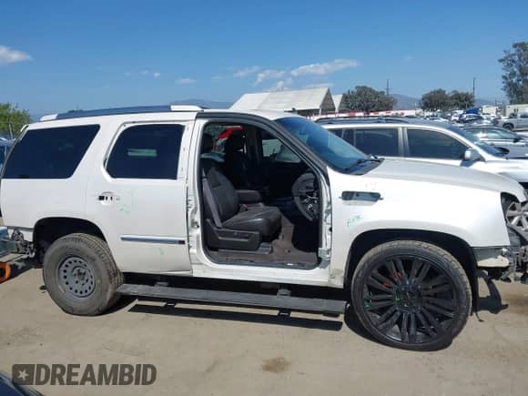 2011 Cadillac Escalade Premium with VIN 1GYS4CEF0BR162201, listed as a IAAI auction lot 42121589 with 160,290 mi miles and . Bid and sale history available at DreamBid. Image 14.