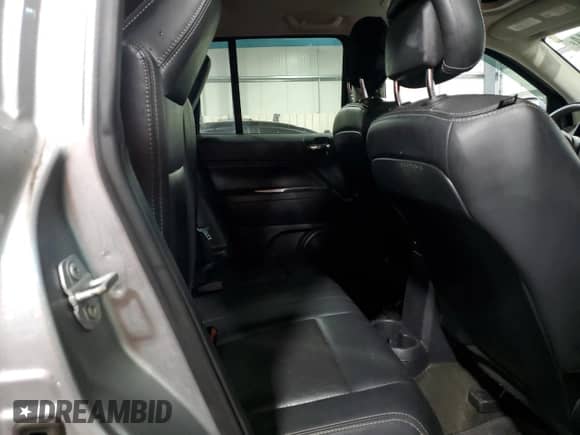 2016 Jeep Compass Latitude with VIN 1C4NJDEBXGD721806, listed as a Copart auction lot 86772214 with 137,065 mi miles and Salvage title. Bid and sale history available at DreamBid. Image 11.