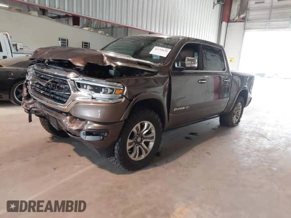 2020 Ram 1500 Longhorn with VIN 1C6SRFKT1LN275397, listed as a IAAI auction lot 42733634 with 101,019 mi miles and . Bid and sale history available at DreamBid. Image 17.