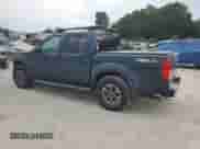 2015 Nissan Frontier SV with VIN 1N6AD0EV2FN734595, listed as a Copart auction lot 68764895 with 89,660 mi miles and Salvage title. Bid and sale history available at DreamBid. Image 2.