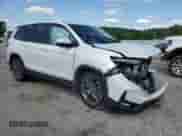 2022 Honda Passport EX-L with VIN 5FNYF7H56NB004766, listed as a Copart auction lot 56058495 with Not provided miles and Salvage title. Bid and sale history available at DreamBid. Image 4.