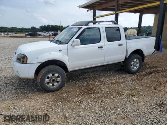 2001 Nissan Frontier SE with VIN 1N6ED27T91C344946, listed as a Copart auction lot 57488105 with 183,127 mi miles and Salvage title. Bid and sale history available at DreamBid. Image 1.