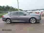 2020 Honda Accord EX-L z VIN 1HGCV1F56LA091007, wystawiony jako IAAI lot #43081794 z przebiegiem 176 800 mil mil oraz . Historia ofert i sprzedaży dostępna na DreamBid. Obrazek 13.