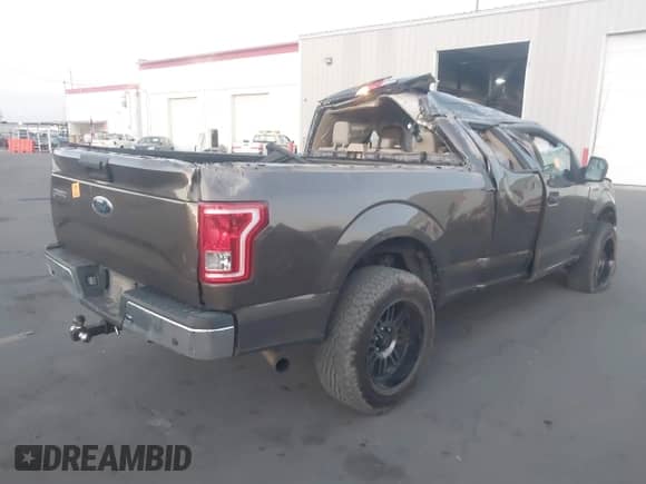 2015 Ford F-150 XLT with VIN 1FTFX1EG6FFB08131, listed as a IAAI auction lot 43210127 with 250,984 mi miles and . Bid and sale history available at DreamBid. Image 4.