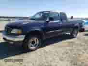 2000 Ford F-150 XL with VIN 1FTRX18W0YKB06899, listed as a Copart auction lot 46170175 with 252,042 mi miles and Salvage title. Bid and sale history available at DreamBid. Image 1.