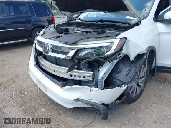 2020 Honda Pilot EX z VIN 5FNYF6H37LB047115, wystawiony jako IAAI lot #42833904 z przebiegiem 77 857 mil mil oraz . Historia ofert i sprzedaży dostępna na DreamBid. Obrazek 6.