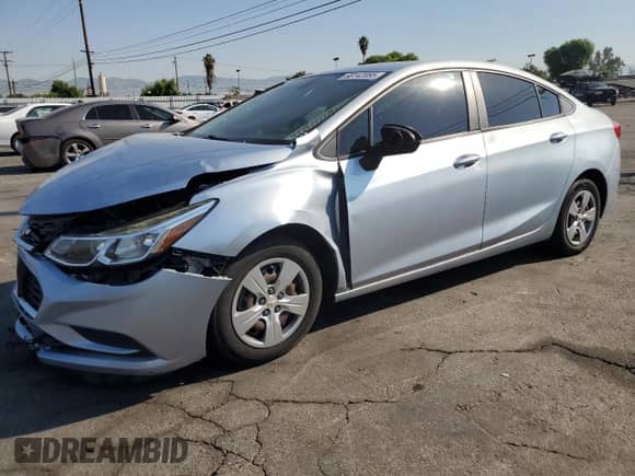 2018 Chevrolet Cruze LS with VIN 1G1BC5SM9J7201927, listed as a Copart auction lot 68142085 with 94,065 mi miles and Salvage title. Bid and sale history available at DreamBid. Image 1.